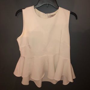 White, high low, zip up back, blouse.